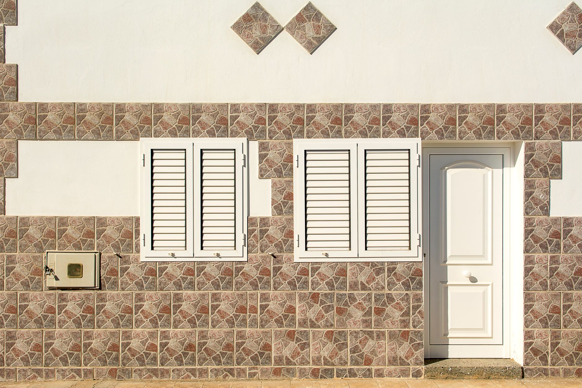 mur parpaing enduit façade