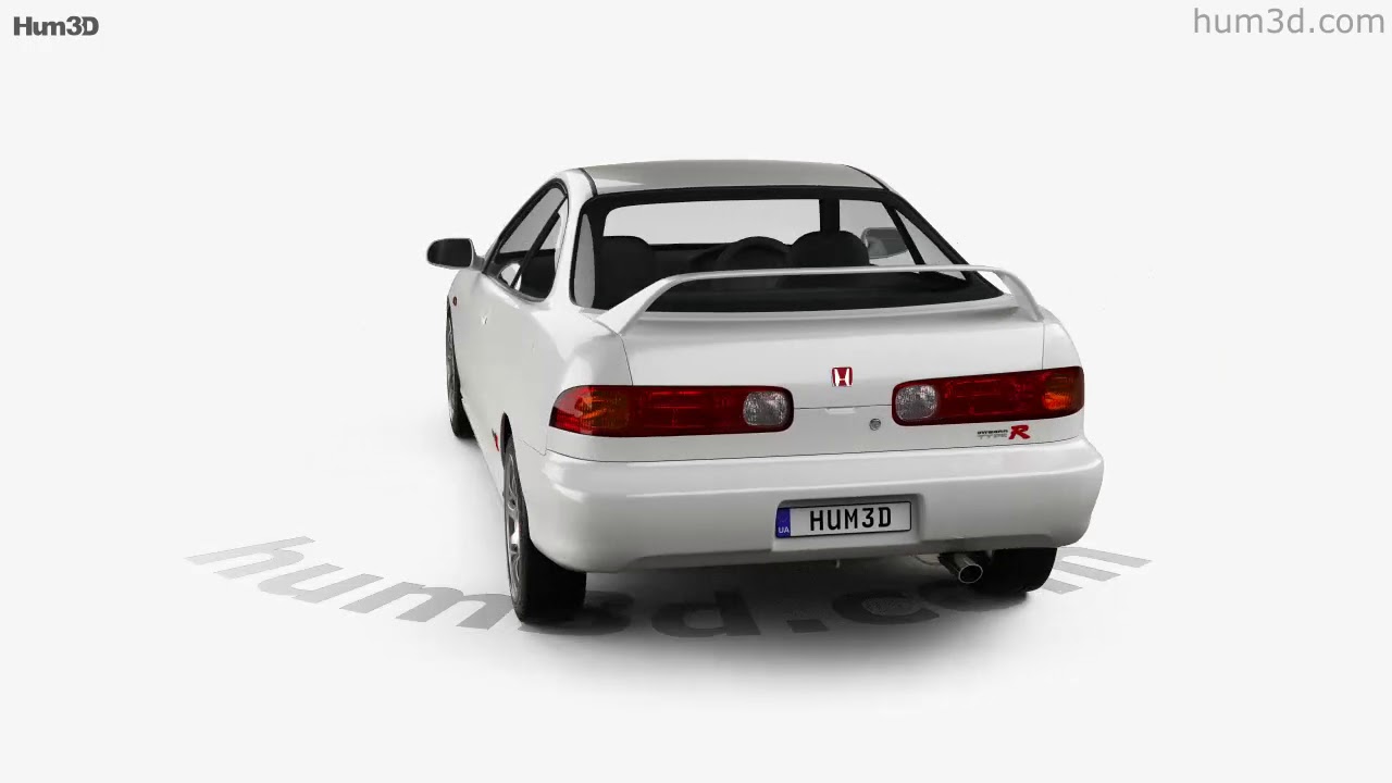 Honda Integra Type R DC2 blanche vue de trois quarts avant sur une route de campagne